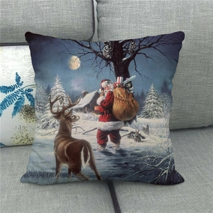 Detail of Christmas Santa and reindeer scene printed on linen textured throw pillow cover