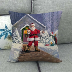 Detailed view of linen Christmas pillowcase featuring vintage Santa Claus and snowy cabin