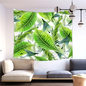 Tropical monstera leaf wall tapestry in a minimalist living room setup for home decor