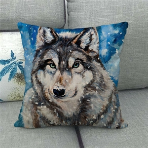 Linen pillowcase featuring an artistic grey wolf painting on a cozy grey sofa