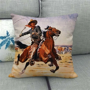Detail of linen cushion cover featuring a vintage cowboy riding a horse on a sofa