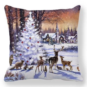 Close-up of Christmas cushion cover showing glowing tree and woodland animals on peach skin