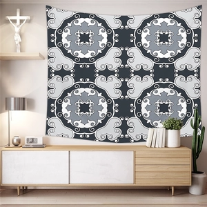 Close-up of bohemian geometric pattern on blue and grey tapestry wall hanging décor