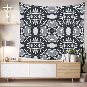 Detail of bohemian mandala tapestry featuring grey geometric patterns for wall decor