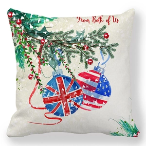 Close-up of peach skin pillowcase with watercolor pine and US & UK flag ornaments