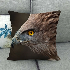 Detailed view of bald eagle print pillow cover on a grey sofa for home decor