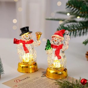 Figurines de bonhomme de neige lumineux avec LED chaude et base dorée chic