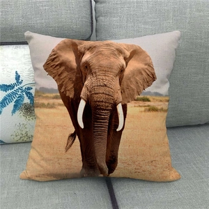 Detailed close-up of a square linen pillowcase with a wild African elephant photo print