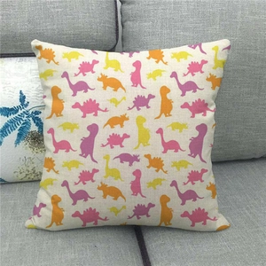 Close-up detail of cartoon dinosaur patterns on heavy linen square pillowcase