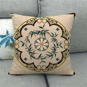Detail showing bohemian geometric circular pattern on a square linen pillowcase