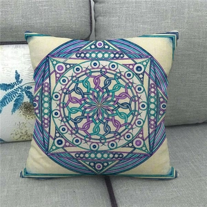 Bohemian mandala pattern linen throw pillow case on a grey fabric sofa for home decor