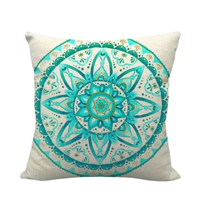 Bohemian linen pillowcase with teal mandala geometric pattern on a white background