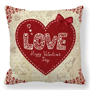 Valentine's Day heart pillowcase with LOVE text and a red satin bow on beige fabric
