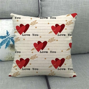 Close-up of linen Valentine's Day pillowcase with red heart pattern and Love You text