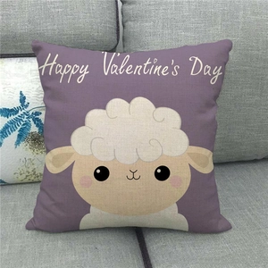 Close-up of linen pillowcase with purple Valentine's Day cartoon sheep and text detail