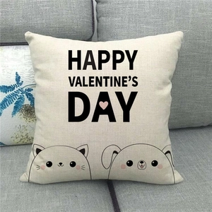 Close-up of linen Valentine's Day pillowcase with Happy Valentine's Day text and animals