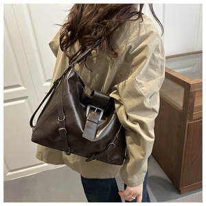 Large dark brown PU leather tote bag with metallic buckle detail shown on shoulder