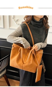 Caramel suede large tote bag with top handles and adjustable strap side view