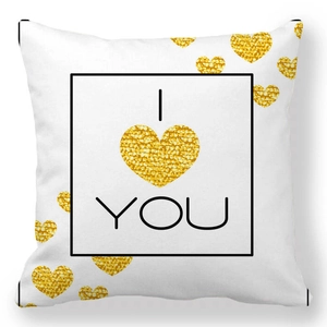 Close-up of peach skin pillowcase with gold sequin hearts and I Love You text print