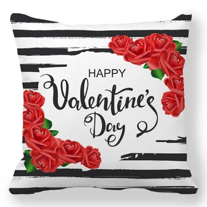 Detailed view of the peach skin Valentine's pillowcase with red roses and stripe texture