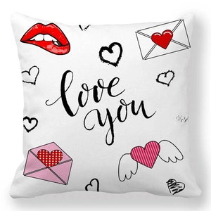 Detail of soft peach skin pillowcase with romantic heart, lips and love you print