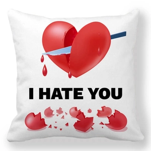 Macro view of peach skin pillowcase with bleeding heart and I HATE YOU bold text