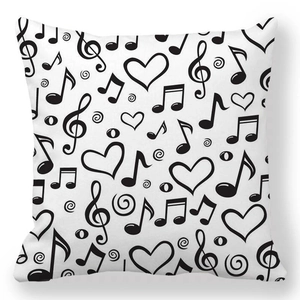 Detail view of heart and music note pattern on square peach skin pillowcase