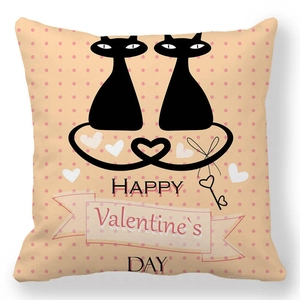 Detail of soft peach skin pillowcase with cute cats silhouette and Valentine's Day text