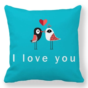 Detail of cyan bird illustration and I love you print on square peach skin pillowcase