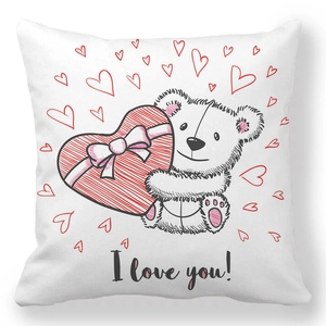 Detail of white square pillowcase with teddy bear holding a heart and I love you text