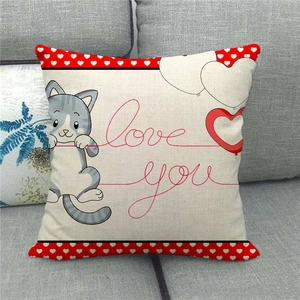 Linen square throw pillow cover with cartoon cat and love you heart design on sofa