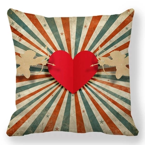 Detail of vintage heart and Cupid print on peach skin pillowcase for Valentine's Day decor