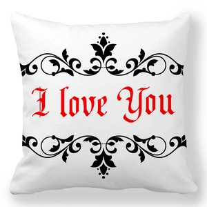 Close-up of peach skin pillowcase with I love You text and vintage vine patterns