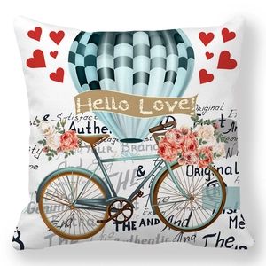 Detailed close-up of retro peach skin pillow cover with mint bike and floral design