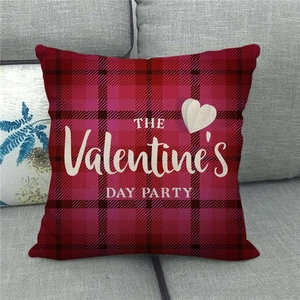Detail of red and black buffalo plaid linen pillow cover with Valentine's Day party print