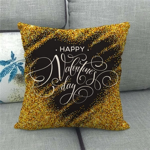 Close-up of Happy Valentine's Day linen pillowcase with golden glitter dots on a sofa