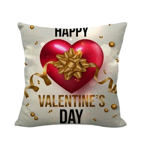 Linen Valentine's Day pillow case with large red heart and golden bow on beige base