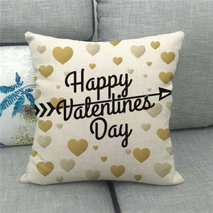 Detail of linen Valentine's Day pillowcase with gold heart and Happy Valentine's Day text