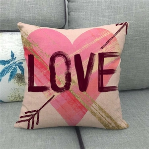 Linen Valentine's Day throw pillow cover featuring pink heart and LOVE text for home decor