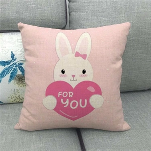 Detailed texture of pink linen pillowcase featuring a cute cartoon rabbit with FOR YOU text