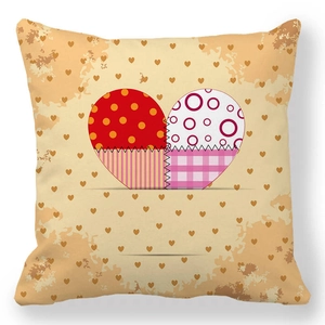Detail of peach skin pillowcase showing patchwork heart design and zigzag stitching