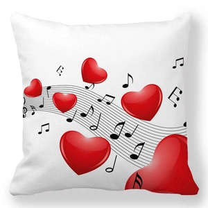 Detail of white peach skin pillowcase with romantic red heart and musical note patterns