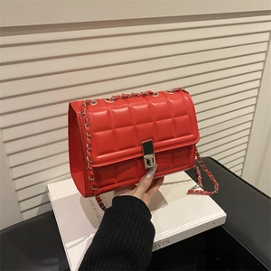 Chic quilted red crossbody bag with silver twist lock and chain strap for women