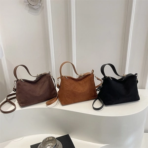Retro frosted leather handbag in brown and black tones with gold hardware detail