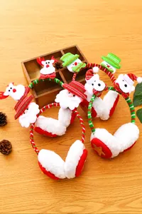 Detail of plush Christmas earmuffs featuring Santa, reindeer, and striped knit headbands