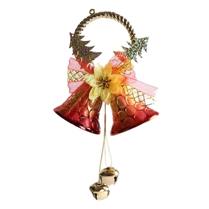 Close-up of Christmas bell hanging ornament with red metal bells and gold glitter accents