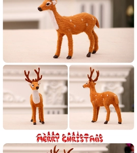 Detail of plush reindeer figurines with antlers and white spots for Christmas decor