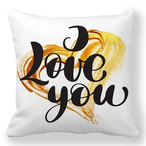 Close-up of peach skin pillowcase with black Love You text and golden heart design