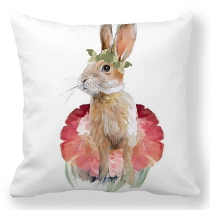 Detail of soft peach skin fabric texture with watercolor bunny and red floral print