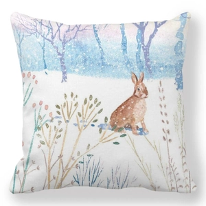 Macro detail of Easter bunny and snow scene print on durable peach skin cushion cover